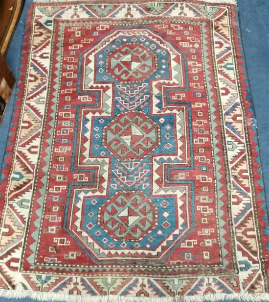 An early 20th century Kazak rug 140 x 100cm